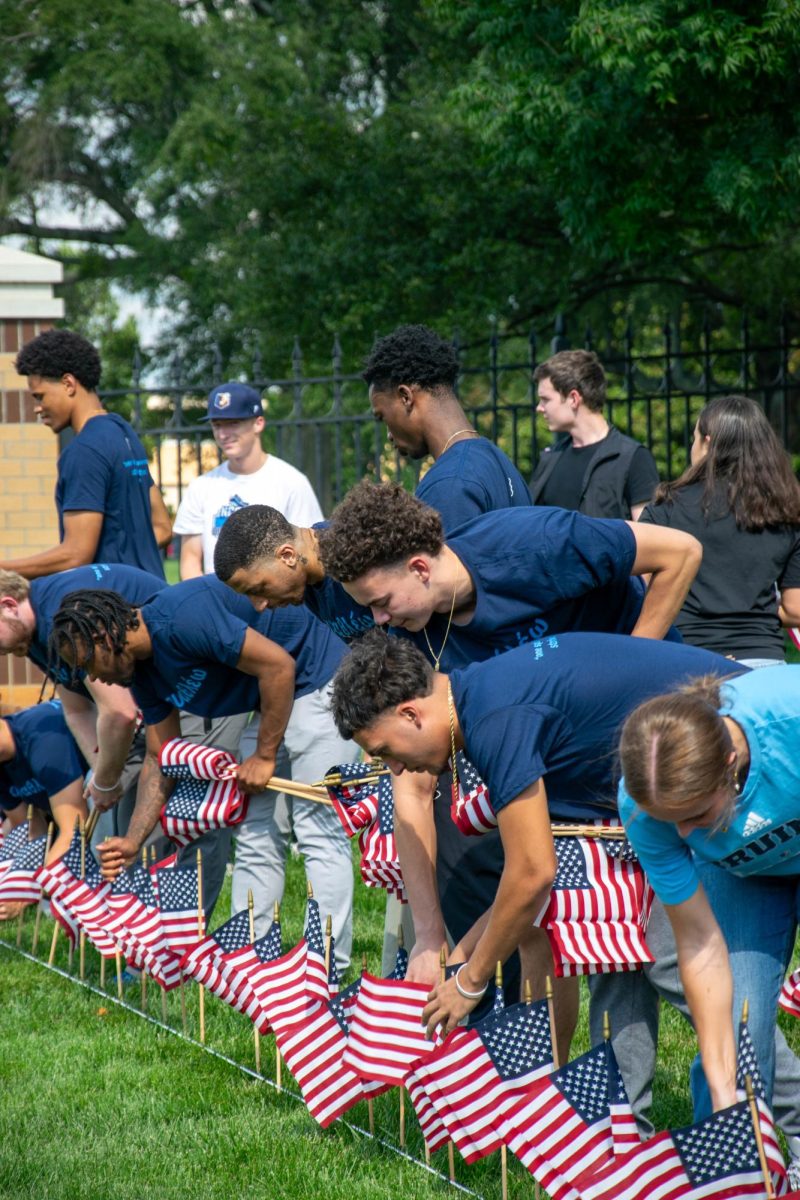 Students placed flags on front campus for each 9/11 victim.