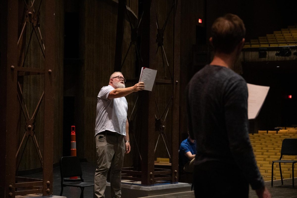 The cast of King Lear reading through the script at Rodeheaver Auditorium.