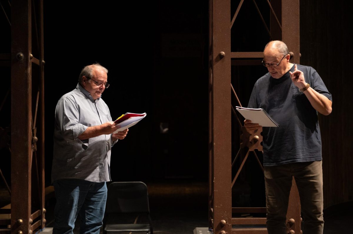 The cast of King Lear reading through the script at Rodeheaver Auditorium.