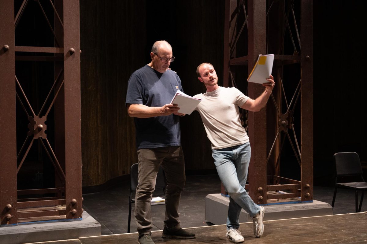 The cast of King Lear reading through the script at Rodeheaver Auditorium.