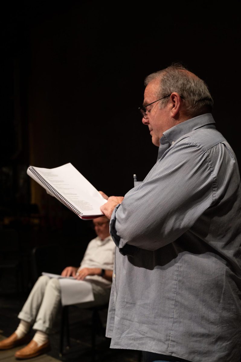 The cast of King Lear reading through the script at Rodeheaver Auditorium.