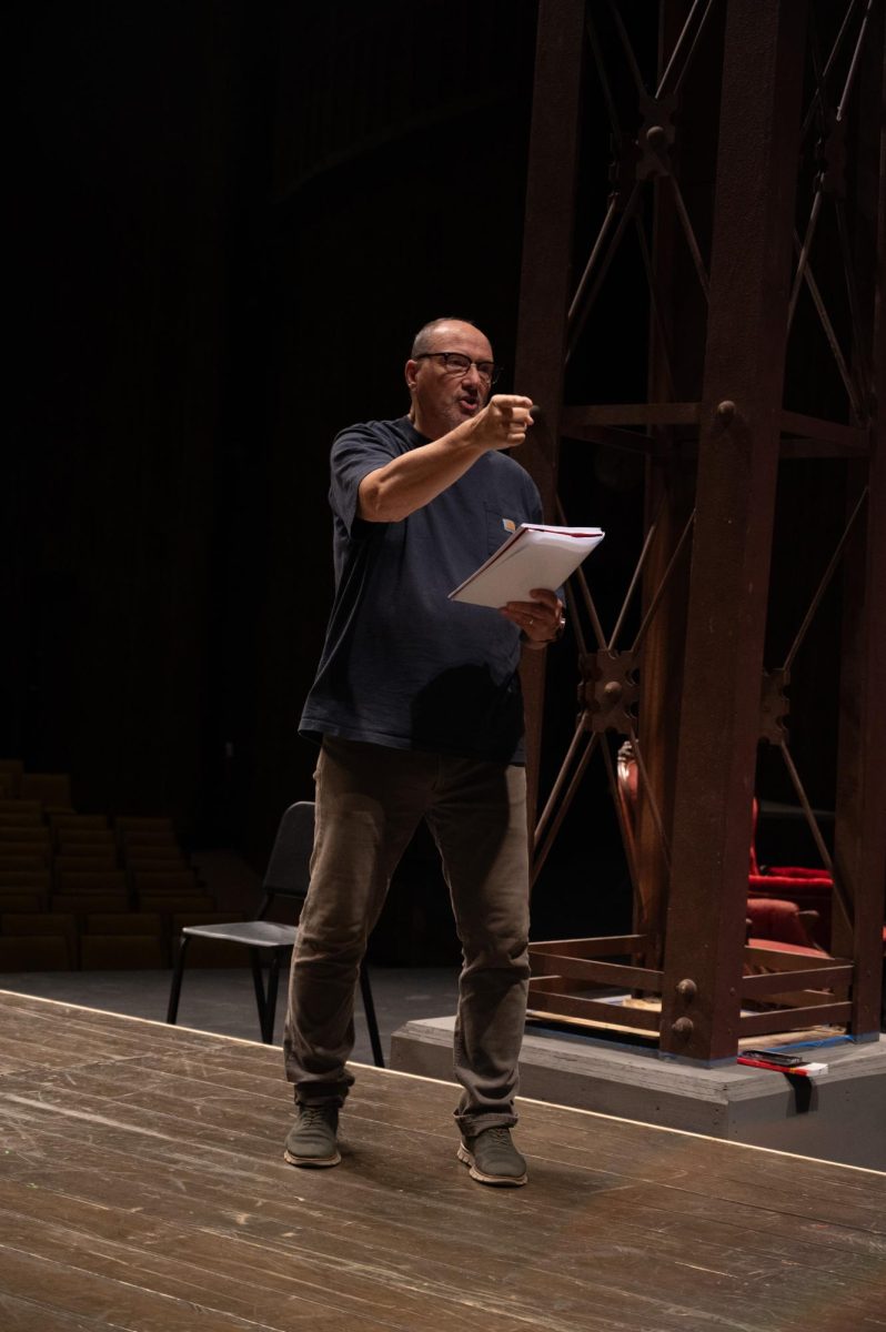 The cast of King Lear reading through the script at Rodeheaver Auditorium.
