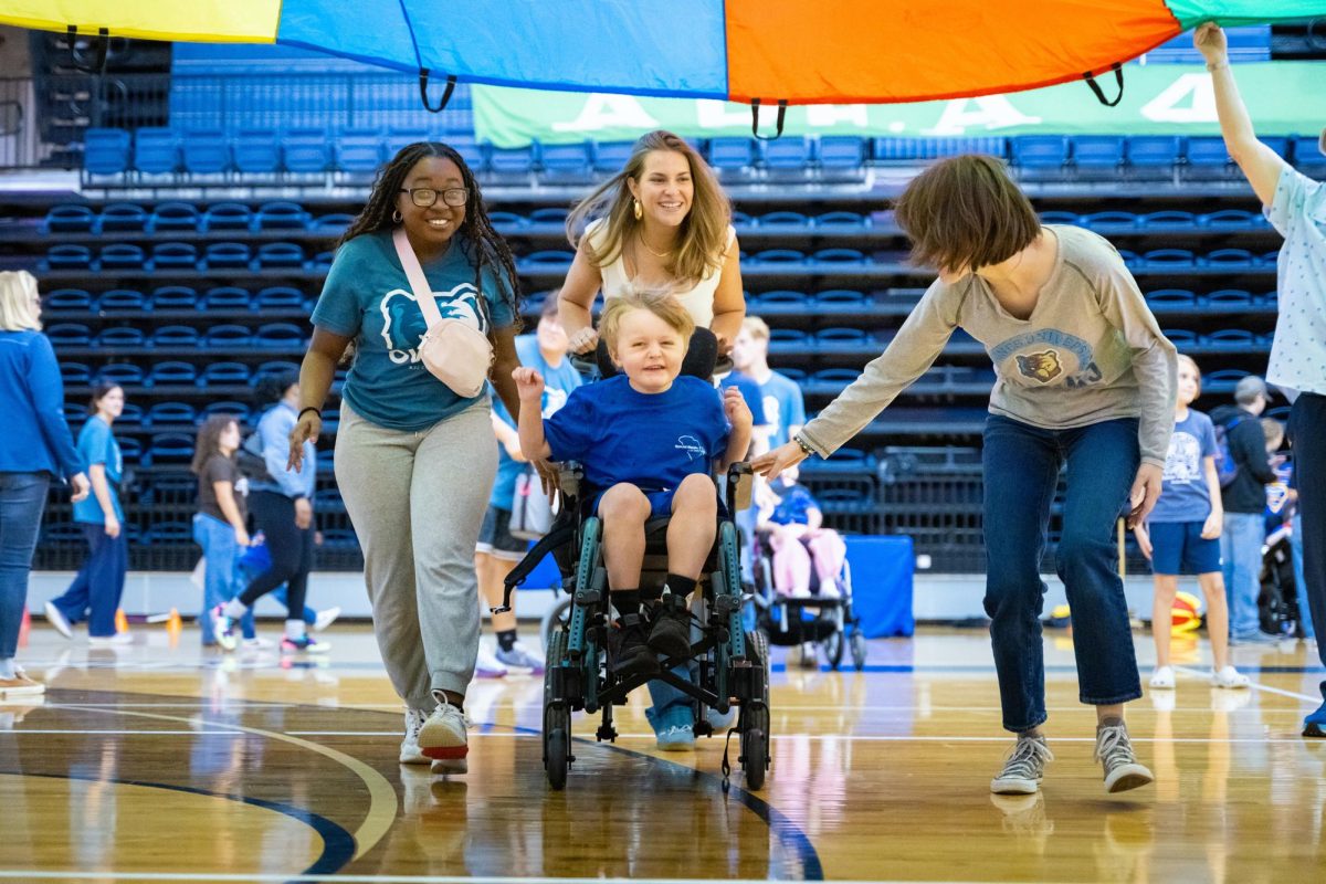Students and families from Washington Center School participate in the 30th annual Washington Center Challenge Day, Oct. 3, inside the Davis Field House at BJU. Photo provided by Derek Eckenroth/BJU