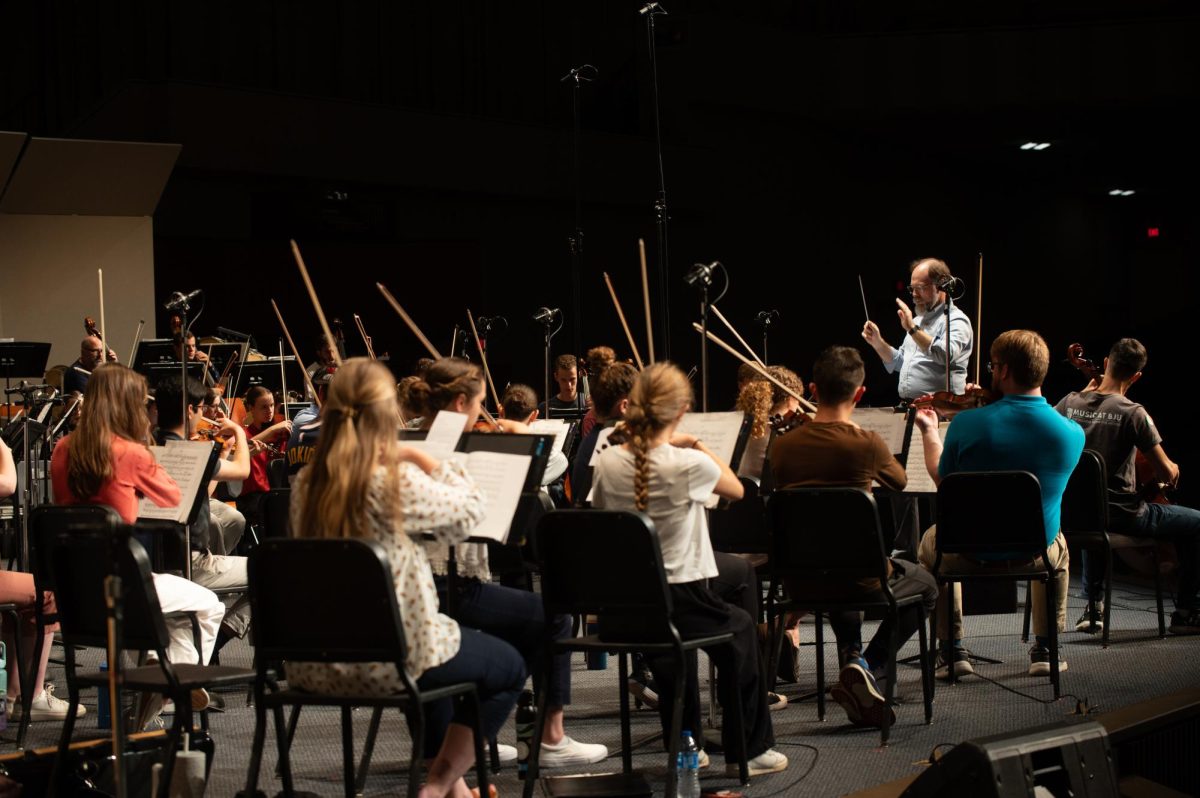 Students rehearsing for Artist Series with David Kim