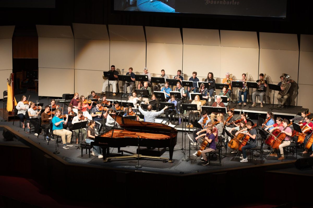Students rehearsing for Artist Series with David Kim