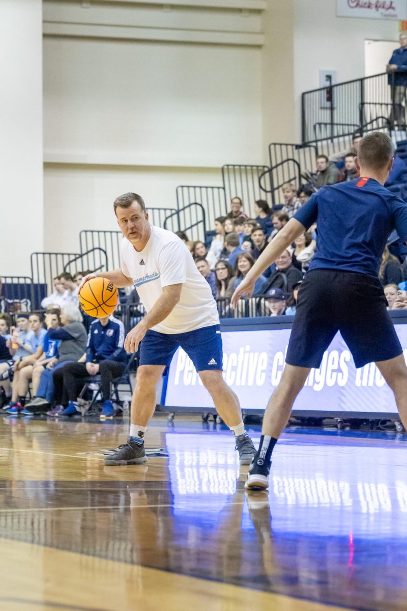 Mr. Aaron Burk, director of the Center for Leadership Development, plays in a Faculty/Staff basketball game hosted by the Student Athlete Advisory Counsel in Davis Field House on Feb. 20. 
