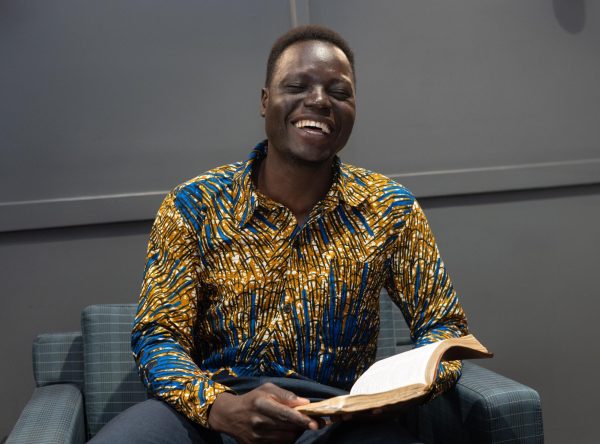 Shadrach Nyeko laughs while having his photo taken. The Uganda native is working towards a doctorate at BJU Seminary to return home and open a school to train church planters.