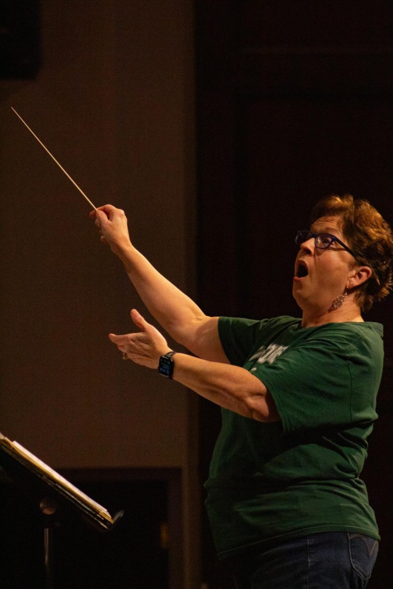 Dr. Pattye Casarow conducts the choir