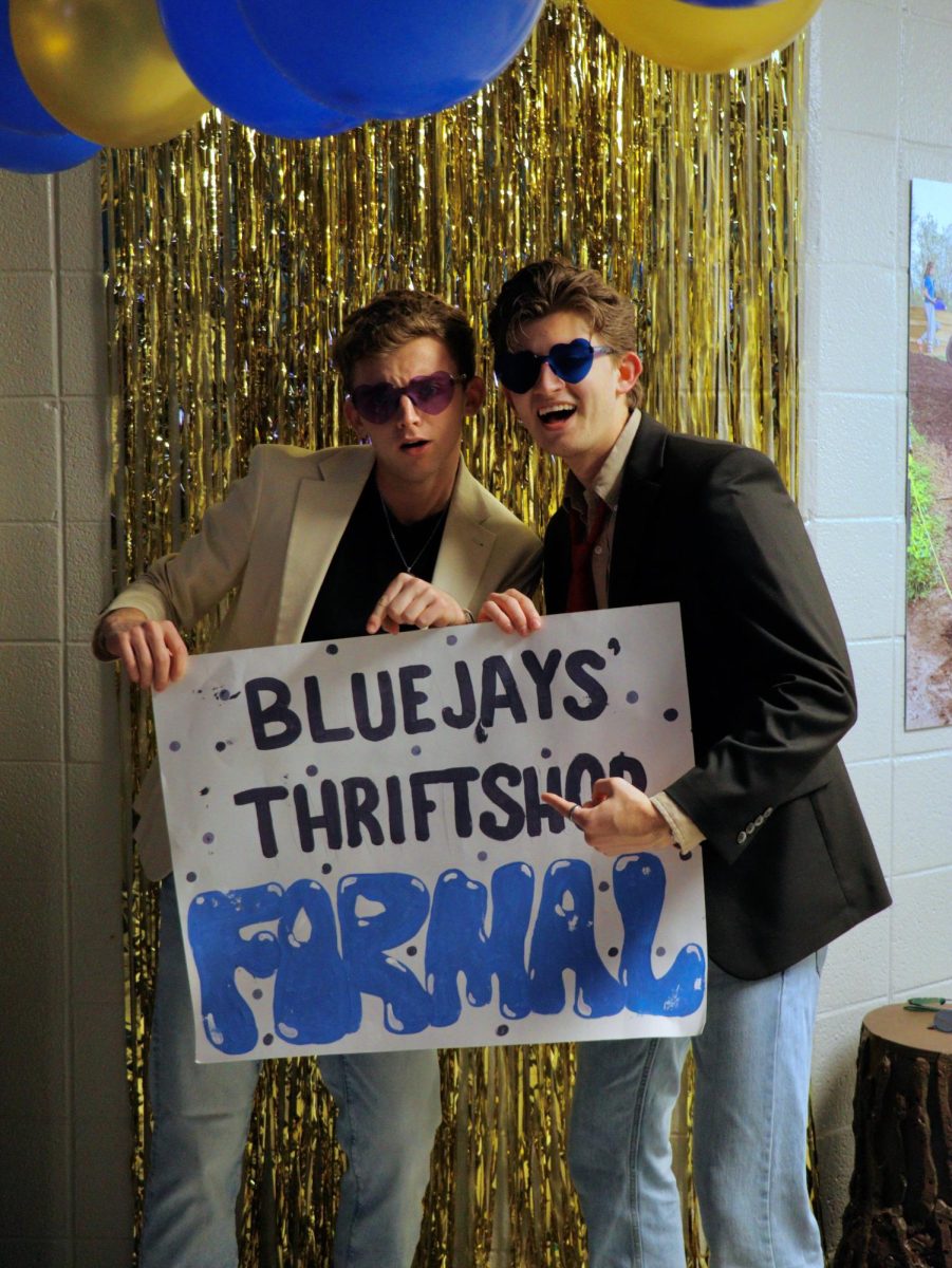 Matthew and Andrew Carver posing at Bluejays' Thrift Shop Formal