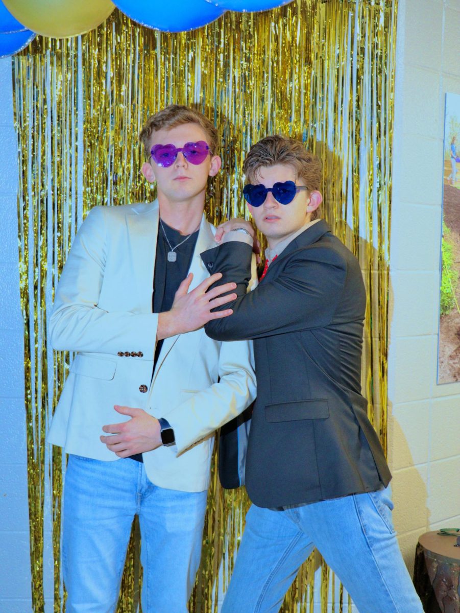 Matthew and Andrew Carver posing at Bluejays' Thrift Shop Formal