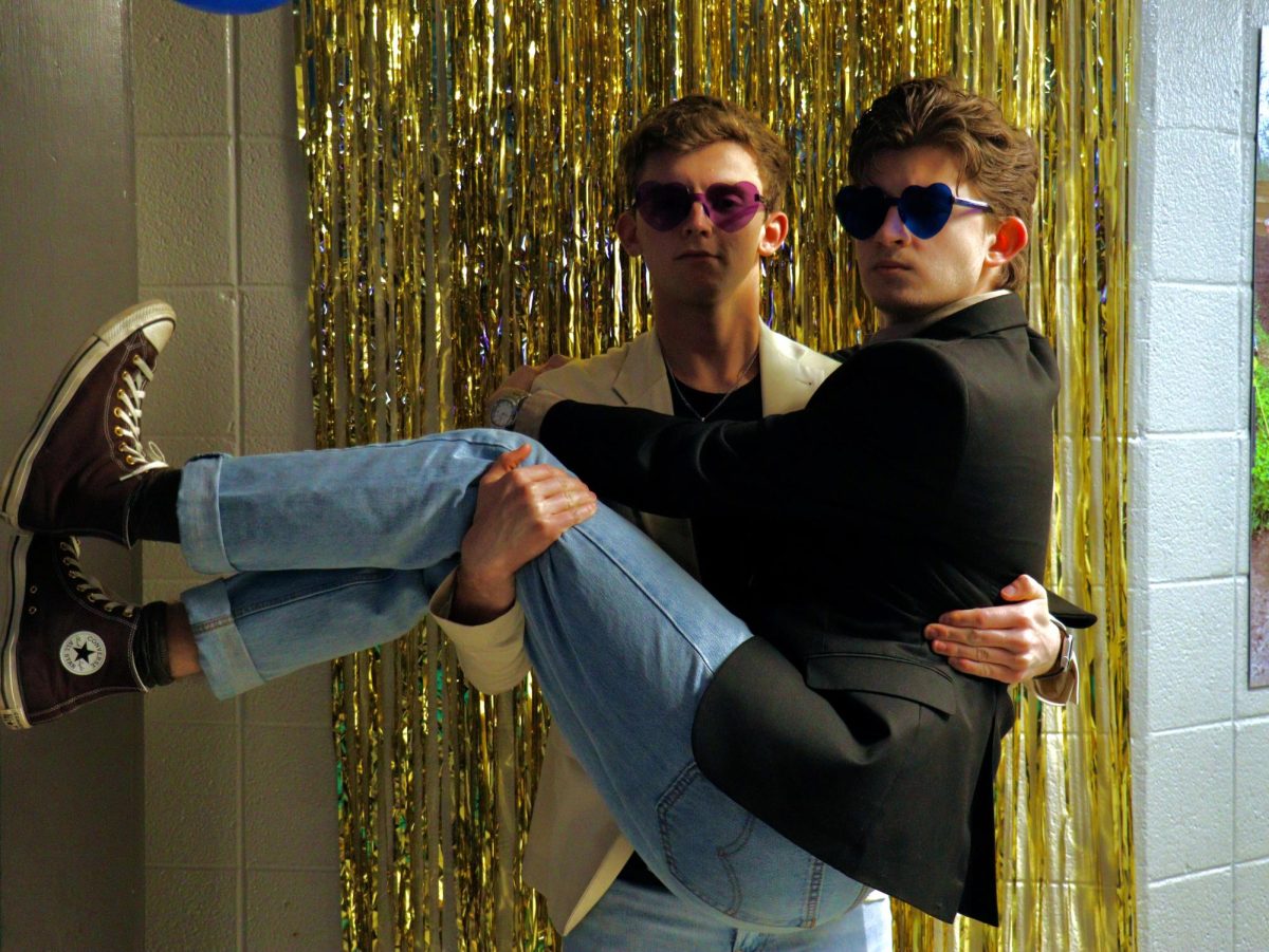 Matthew and Andrew Carver posing at Bluejays' Thrift Shop Formal