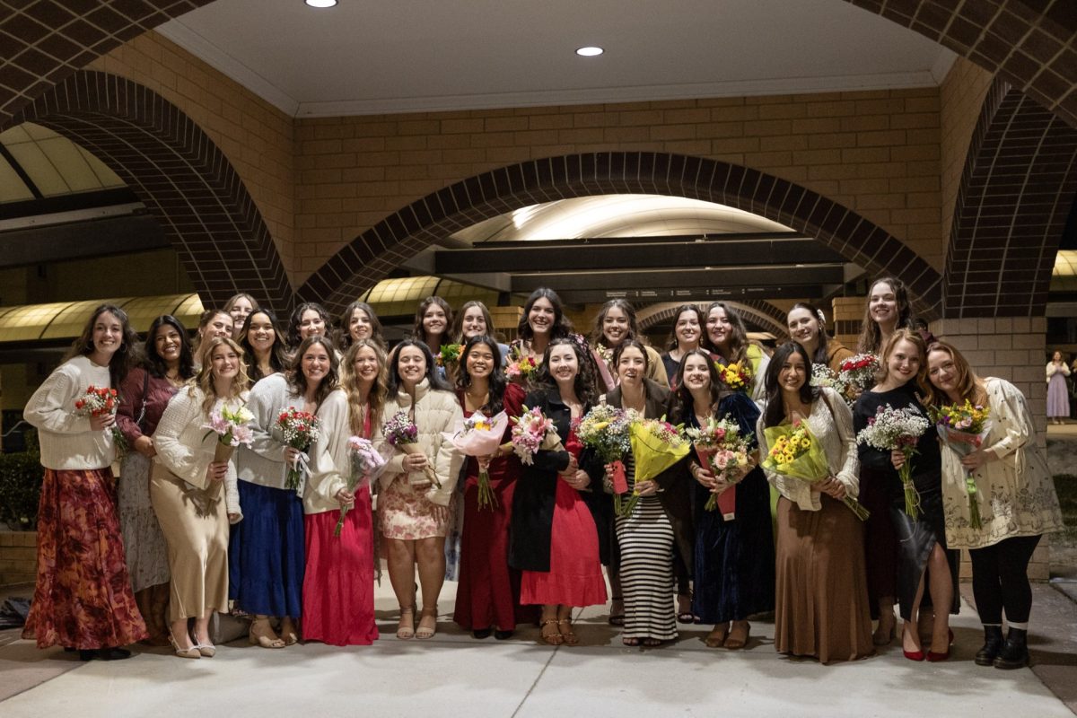 A large group of female students pose for a photo at the Spanish Brass artist series on January 29, 2026.