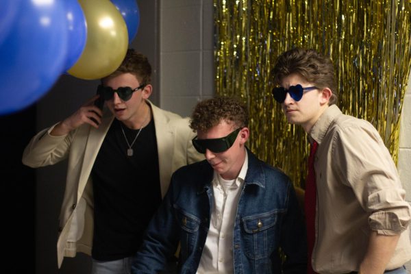 BJU students pose at a thrift formal Bible Conference fundraiser. 