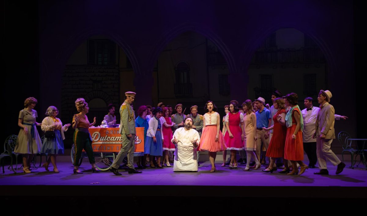 The cast for Elixir of Love rehearsing in Rodeheaver Auditorium
