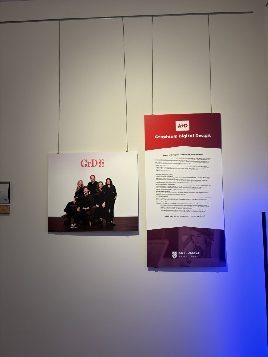 Signs welcome guests to the art and design senior portfolio exhibition for graphic and digital design.